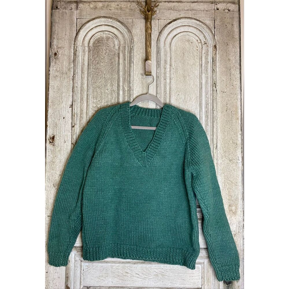 Size large/XL handmade heavy weight wool sweater. Like new condition!